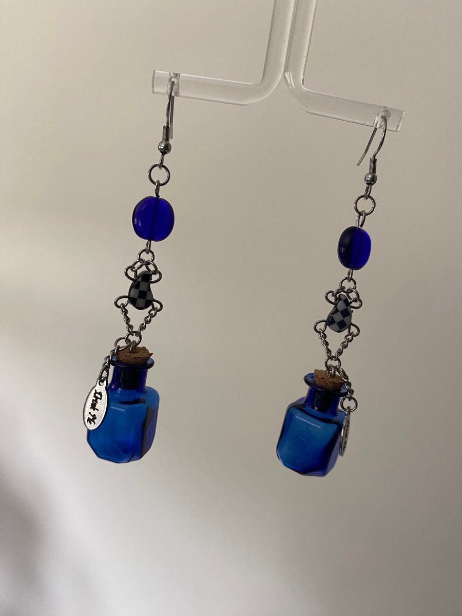 Alice In Wonderland “Drink Me” inspired earrings 