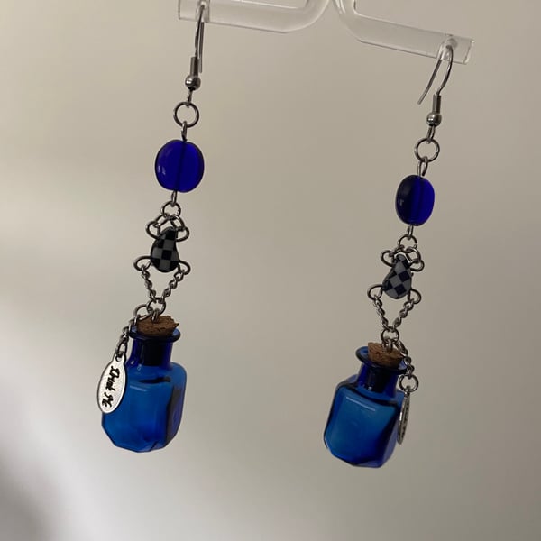 Alice In Wonderland “Drink Me” inspired earrings 