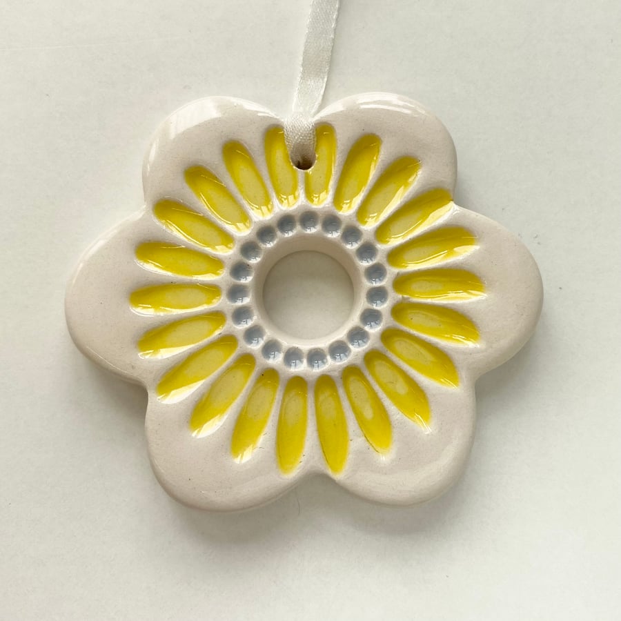 Ceramic flower decoration yellow