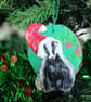 Christmas tree decoration of a Badger with a santa hat made from air dry clay.   - Image 4