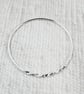 Sterling Silver Bangle with Twist and Crosshatch Pattern. Size Small 19cm  - Image 3