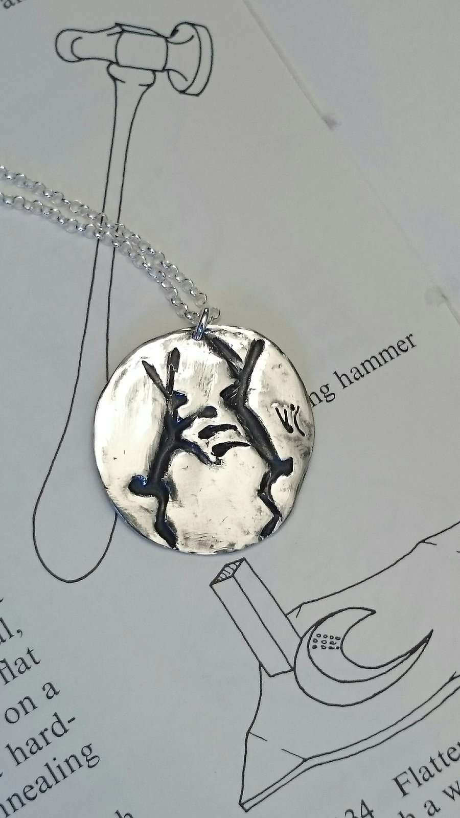 Two Boxing Hares handcarved pendant in fine silver on sterling silver chain