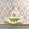 Teeny ceramic dove decoration with leaves and heart
