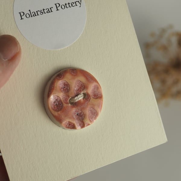 Feature button - Coral pink dimples - Porcelain