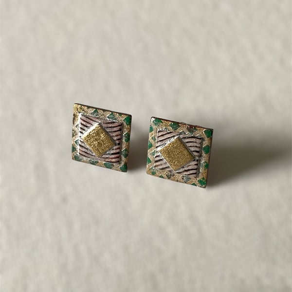 Harlequin Ear Studs with Gold & Silver Embossed Geometric Design.