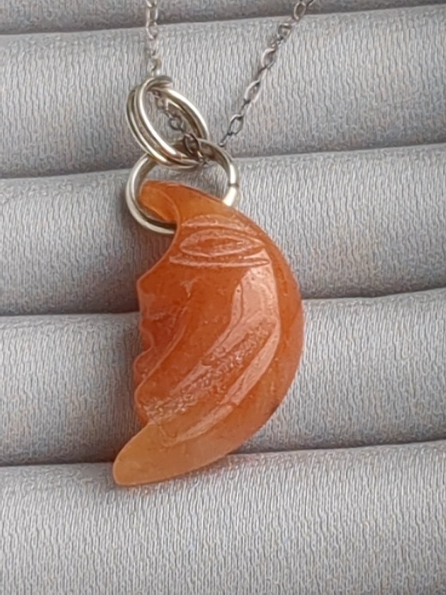 Carnelian crescent moon face in sterling silver pendant 