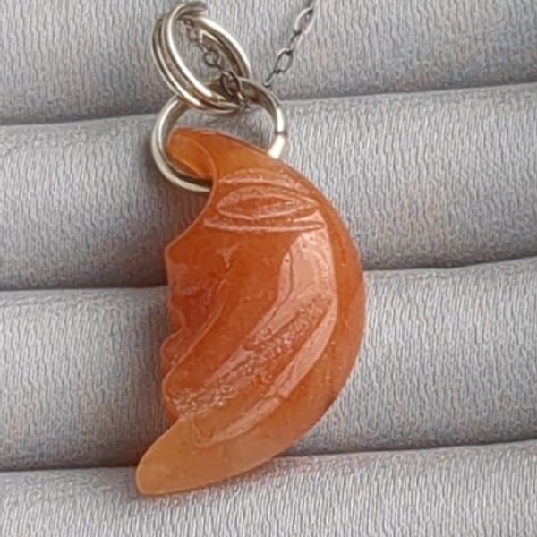 Carnelian crescent moon face in sterling silver pendant 