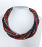 The Wrapped Twist: felted cord necklace in shades of rusty orange and greys - Image 3