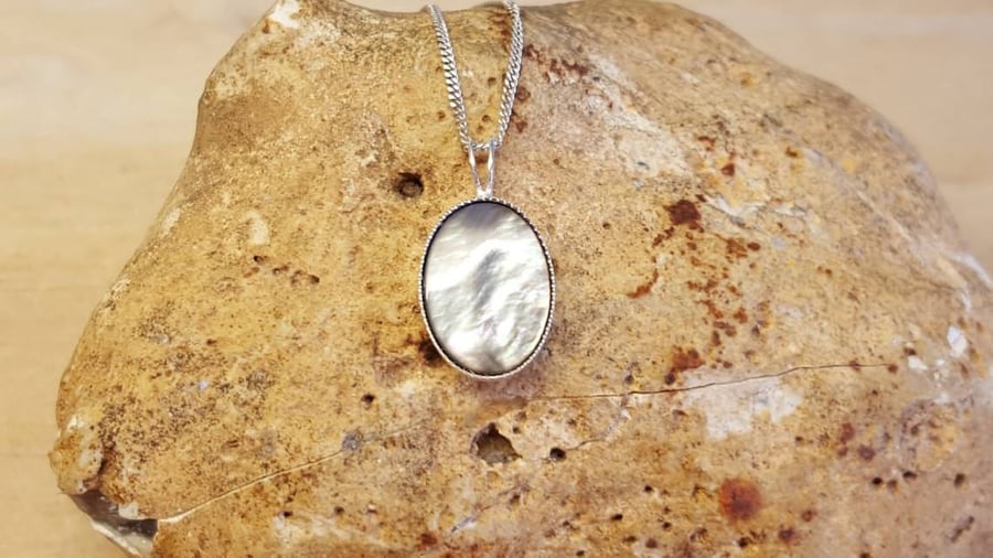 Small Black lip mother of pearl pendant. 14x10mm 925 sterling silver