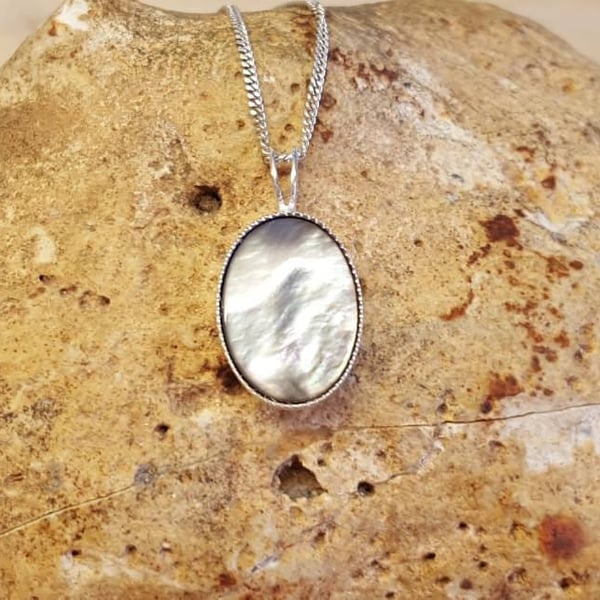 Small Black lip mother of pearl pendant. 14x10mm 925 sterling silver