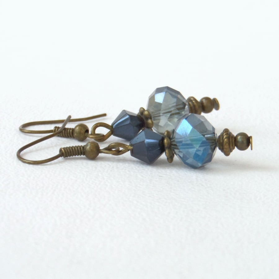 Vintage style bronze earrings with blue crystals
