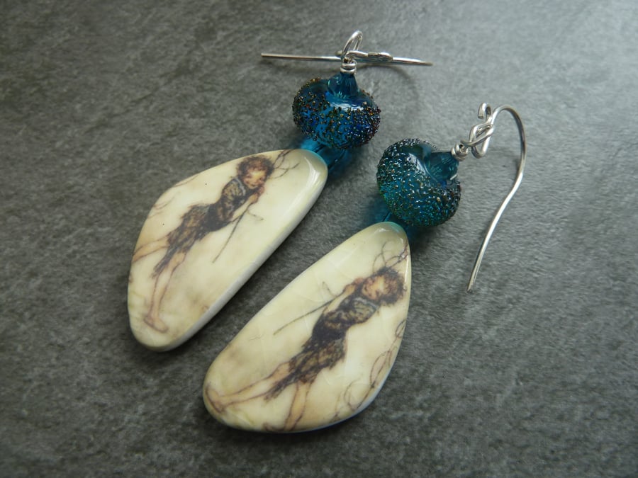 sterling silver, blue lampwork glass, ceramic puck earrings