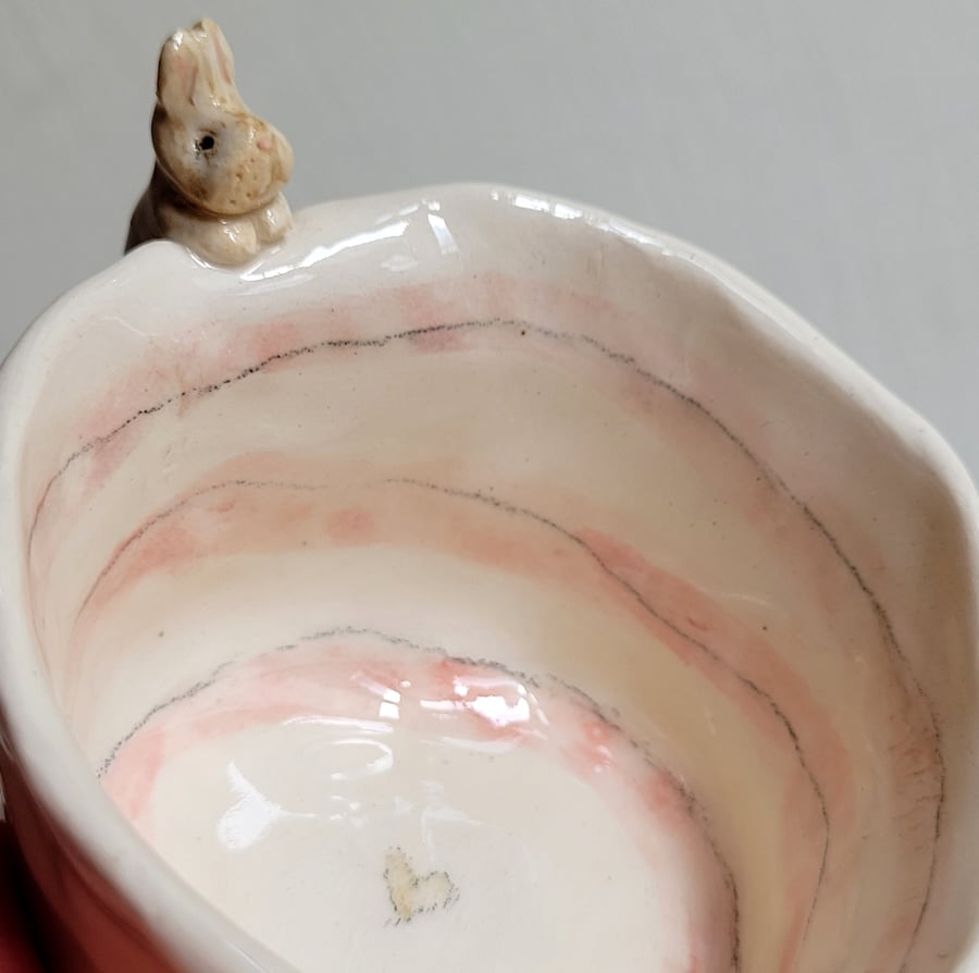 Ceramic tealight wth beige bunny, paw prints  pink stripes, rabbit candle holder
