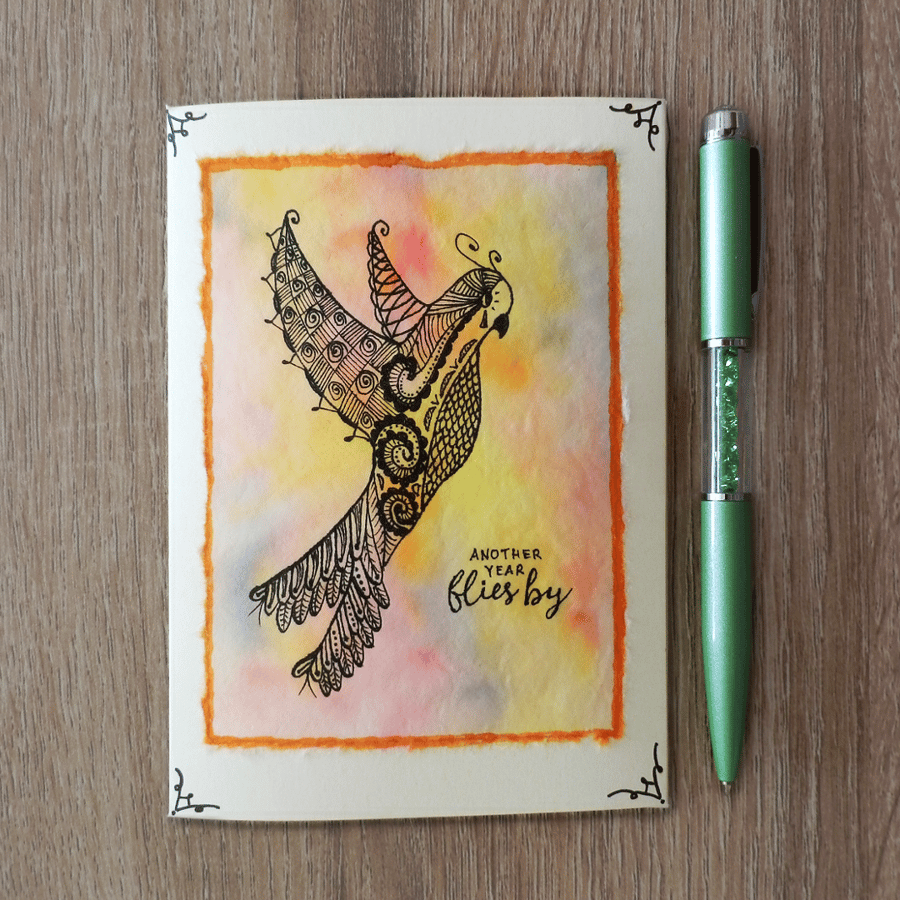 Another year flies by, card with flying bird parrot, hand drawn, orange