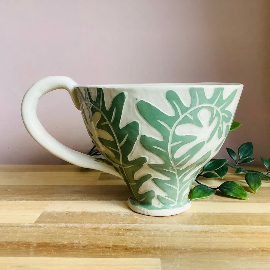 Handmade stoneware sgraffito fern leaf mug 