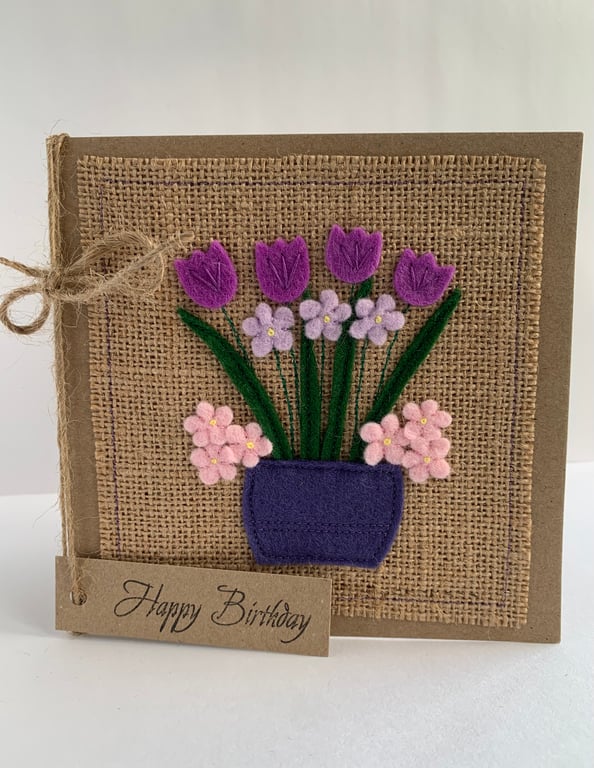 Handmade Birthday Card. A pot of purple and pink flowers from wool felt.