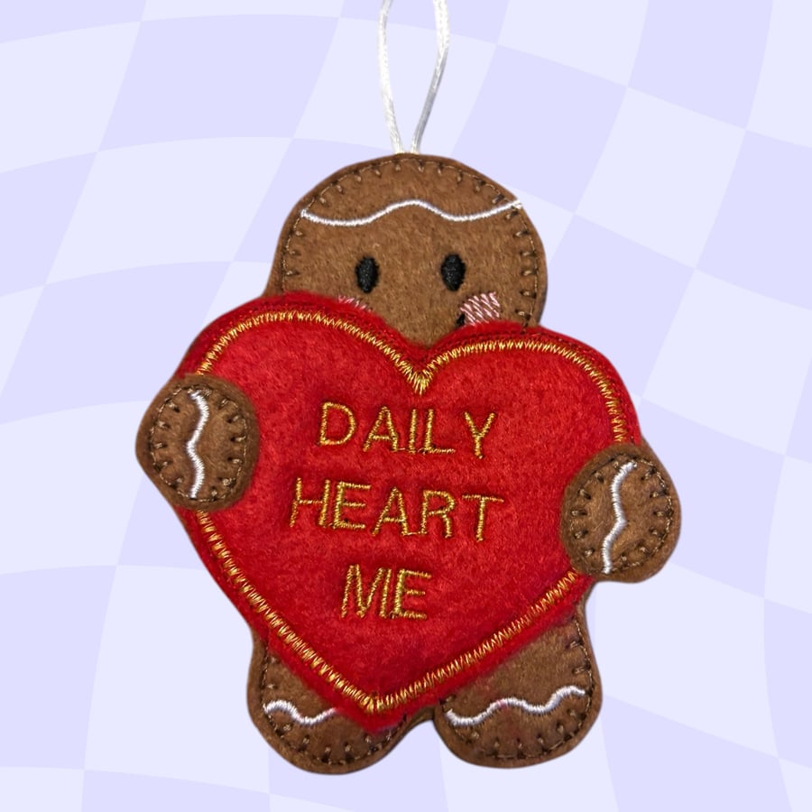 Gingerbread man holding a TikTok daily heart me sign Embroidered Hanging Keepsak
