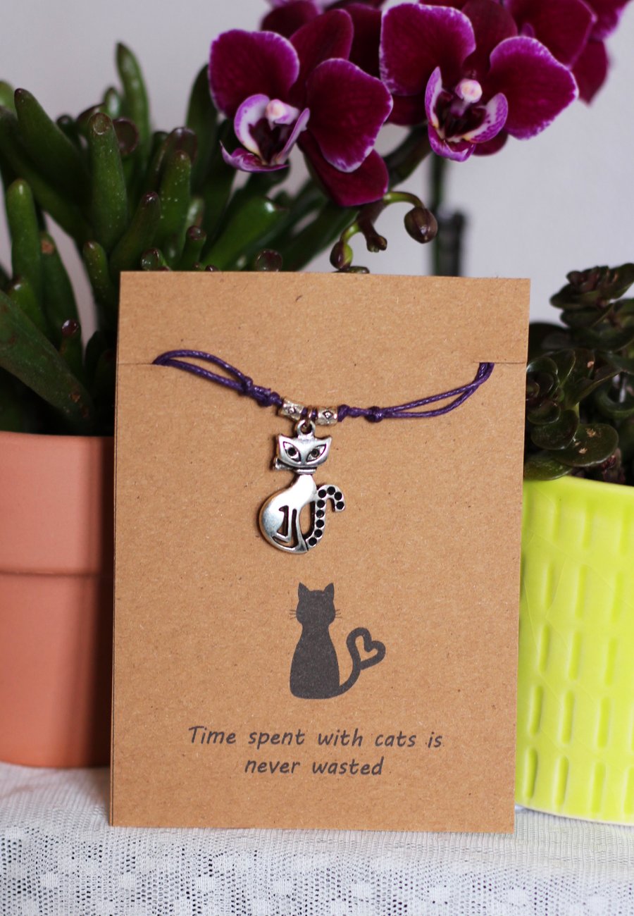 Handmade adjustable friendship bracelet with Tibetan silver cat charm