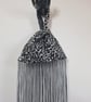 Snow leopard print faux fur fabric Japanese Knot bag with 48cm black tassel trim - Image 4