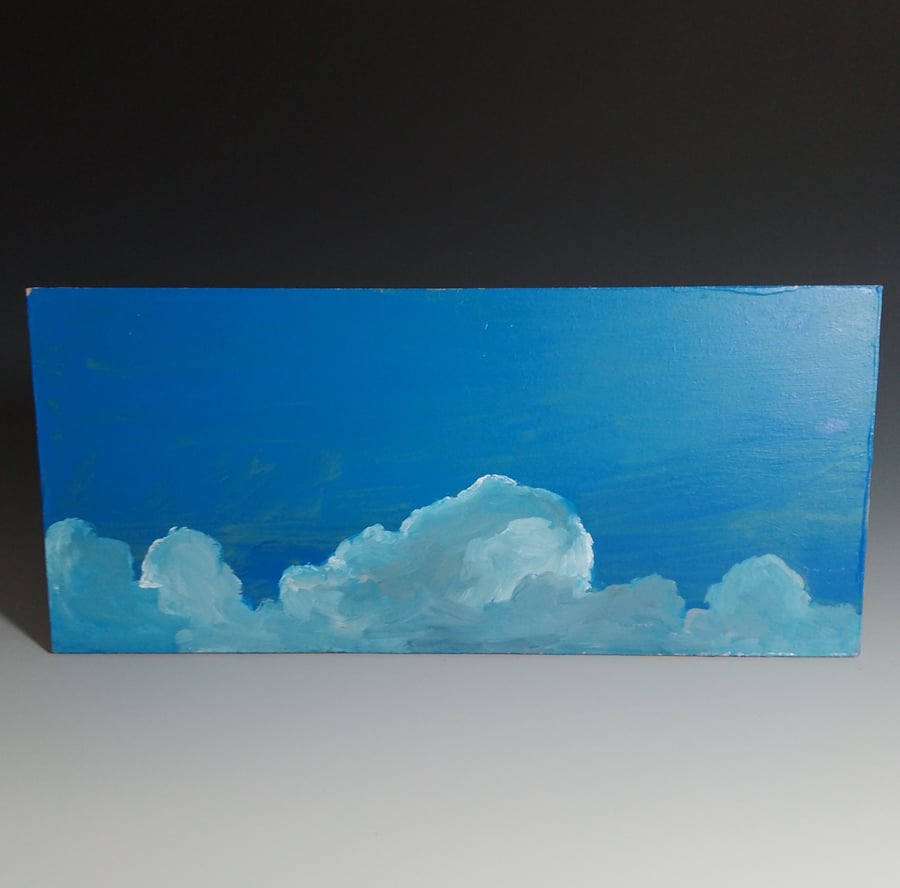 Backlit clouds original oil painting on board