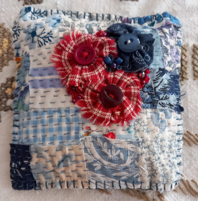 Blue and red kantha-stitched small lavender pillow