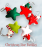 Christmas star hanging decorations baubles in woolly hats, scarves, jingle bells - Image 9