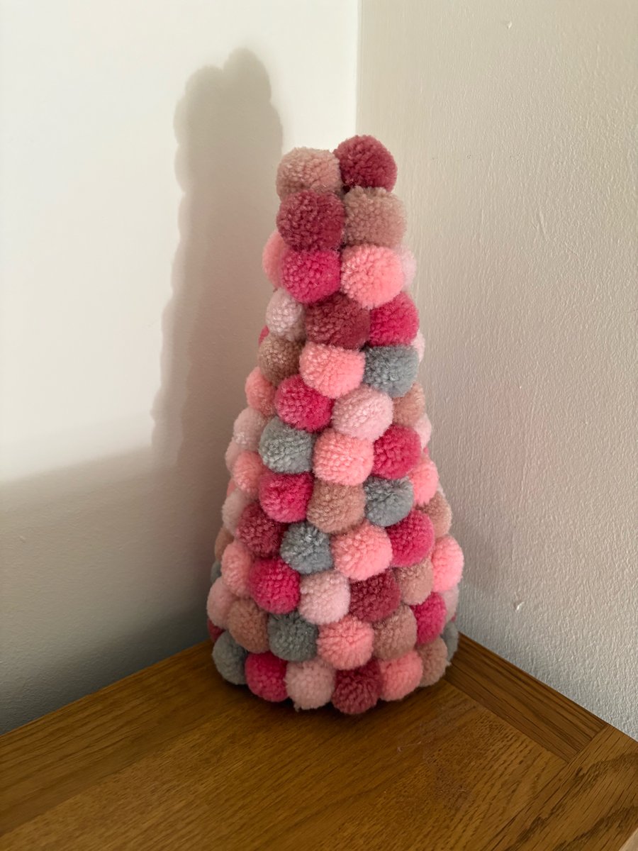 Pom Pom decorated cone. 