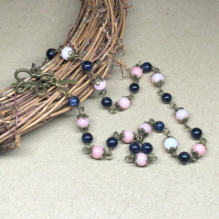 Goldstone and Morganite choker with butterfly clasp