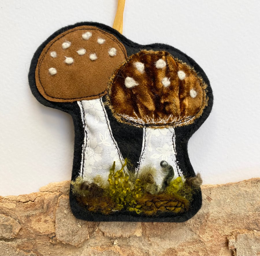 Upcycled embroidered woodland mushrooms home decoration. 