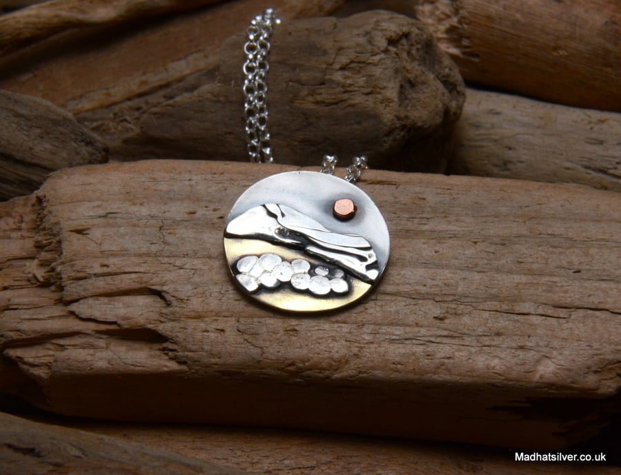 Silver, and brass scenic beach pendant