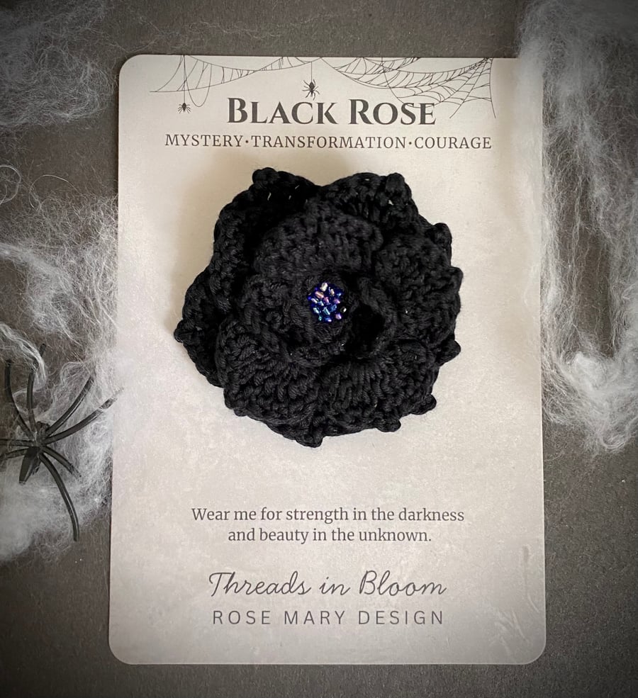 Crocheted black rose brooch