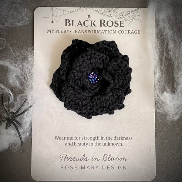 Crocheted black rose brooch