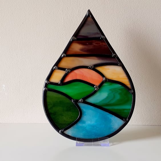 Leaded stained glass river landscape teardrop panel, twilight sky