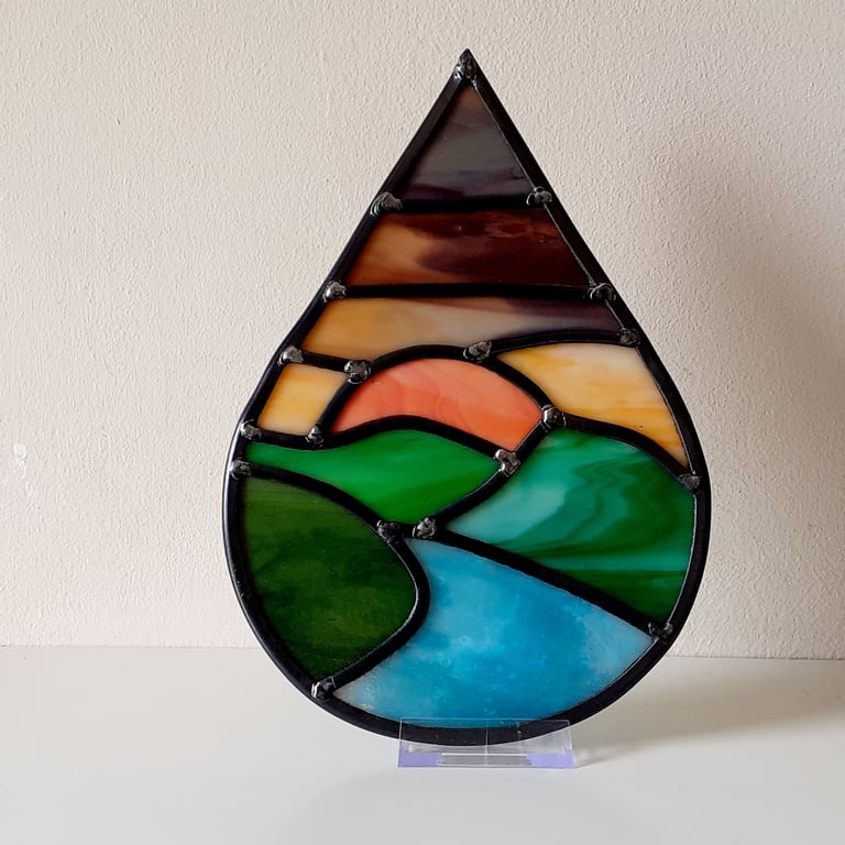 Leaded stained glass river landscape teardrop panel, twilight sky
