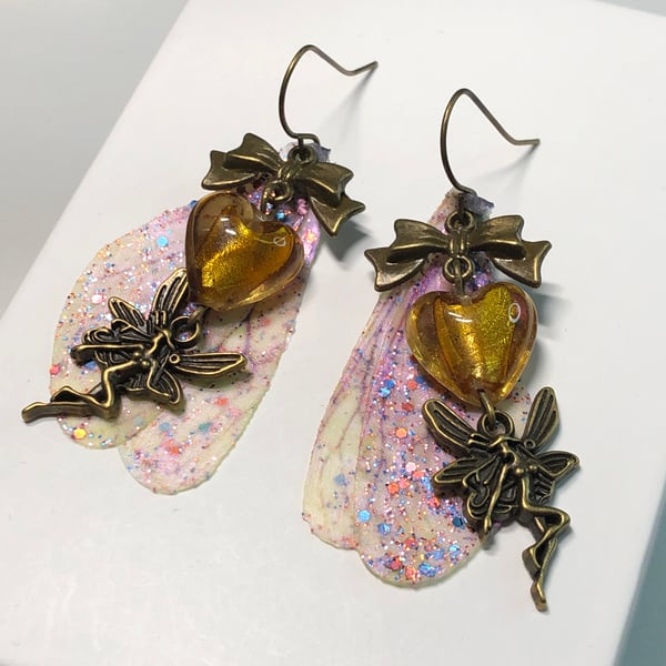 Bronze fairy wing earrings with golden hearts