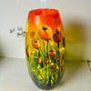 A hand painted and and fired spring glass vase by Andrew Jenkins 