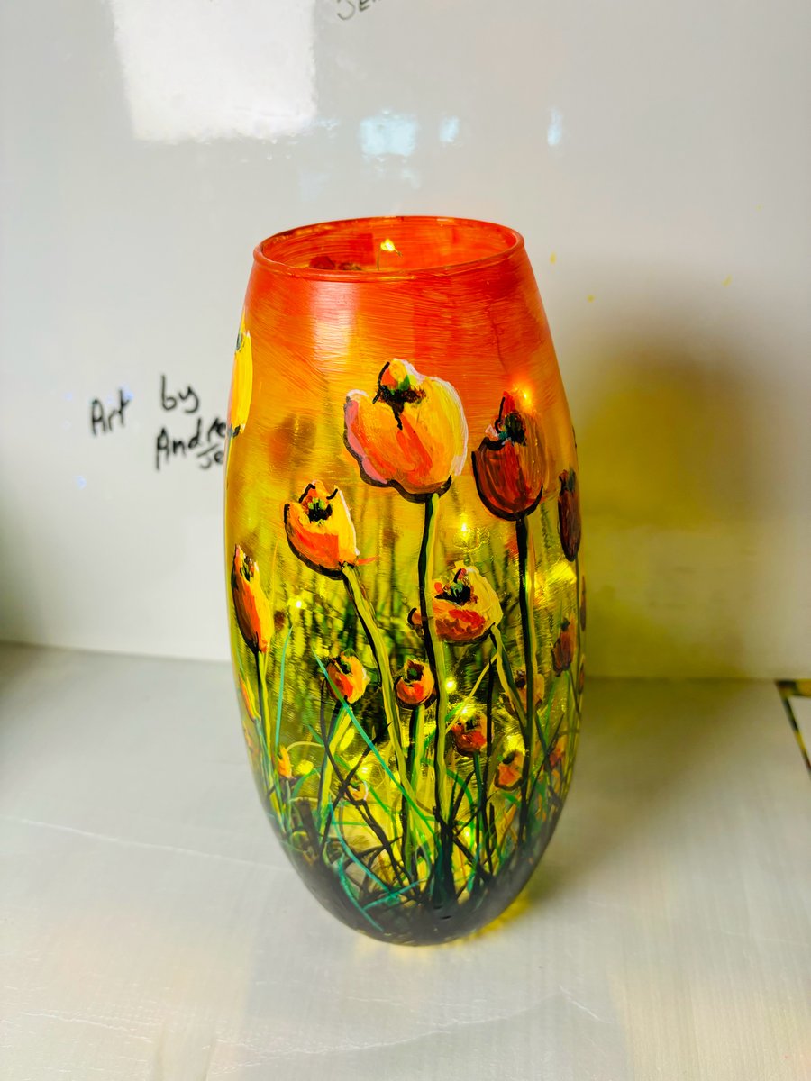 A hand painted and and fired spring glass vase by Andrew Jenkins 