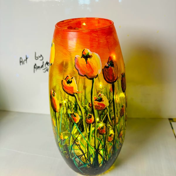 A hand painted and and fired spring glass vase by Andrew Jenkins 