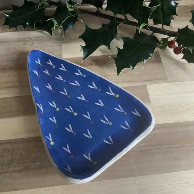 Handmade stoneware blue Christmas tree shaped snack plates Christmas table