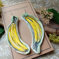 Funky banana statement ceramic earrings on surgical steel hooks