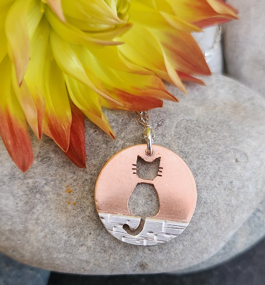 Copper and  sterling silver cat on a wall pendant