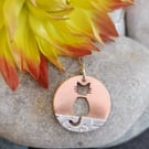 Copper and  sterling silver cat on a wall pendant