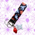 Halloween Printed Ghost Pumpkin Wristlet Keychain with vintage skull charms