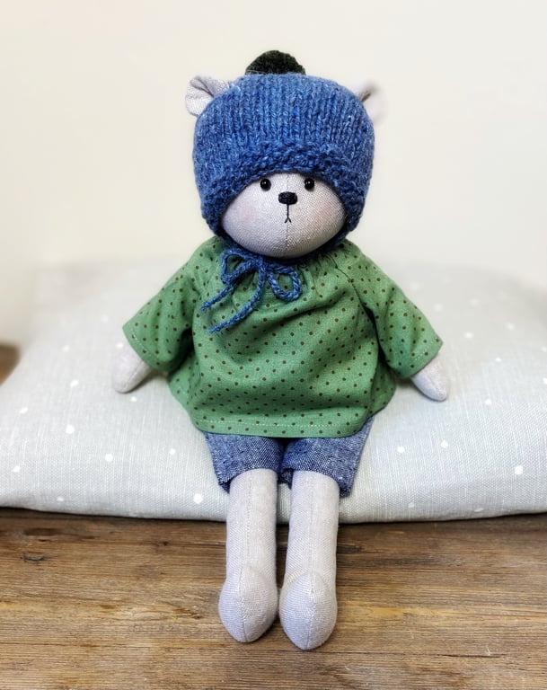 Tabitha, a handmade cloth teddy bear.