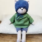 Tabitha, a handmade cloth teddy bear.