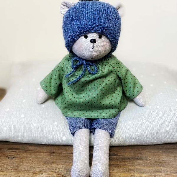 Tabitha, a handmade cloth teddy bear.