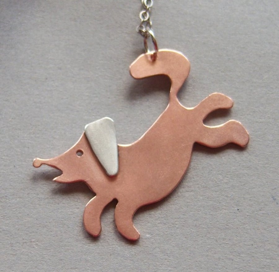 Copper jumping dog pendant