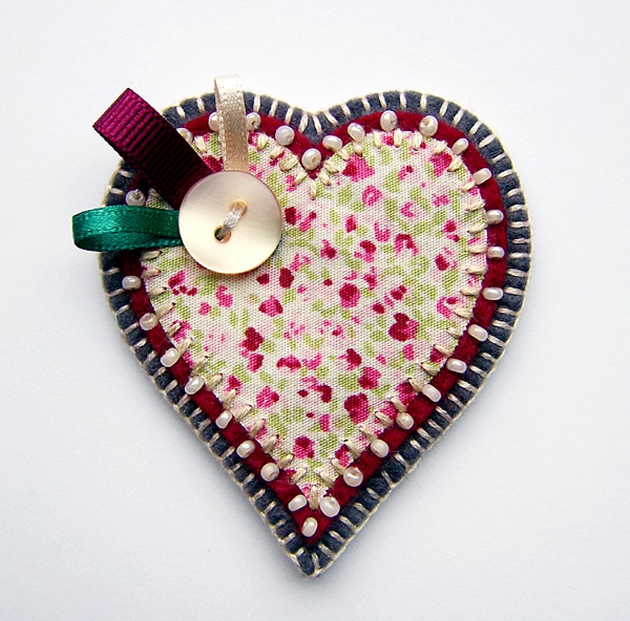 Textile Heart Brooch, appliqué on felt with beading.