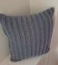 Cushion with handknitted cover 