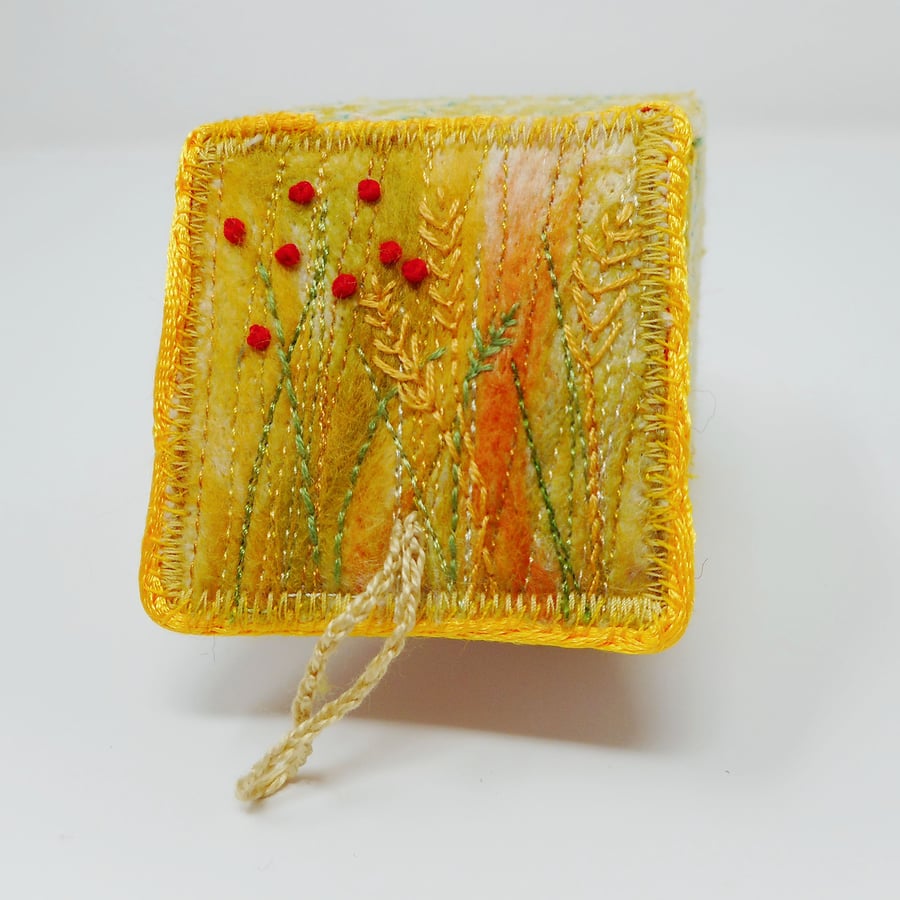 Handmade textile keepsake box with needle felting and hand embroidery 